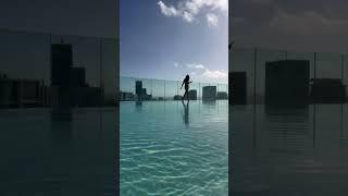 Dan Bilzerian girl poolside walk