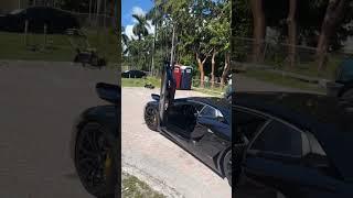 Rick Ross shows his Lamborghini