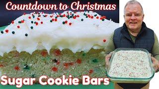 Countdown to Christmas- Sugar Cookie Bars - A Sugar Cookie base topped with creamy frosting!