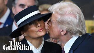 Melania's hat stops Donald Trump kissing her at inauguration ceremony