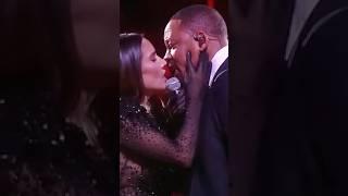 Will Smith kisses India Martínez during performance